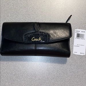 Gently used black Coach wallet